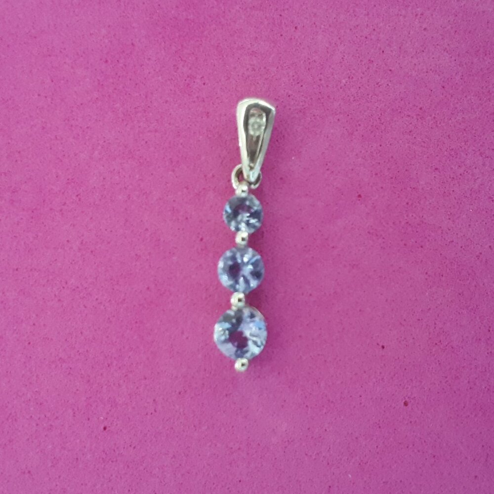 Dainty Tanzanite Pendant set in 10K White Gold